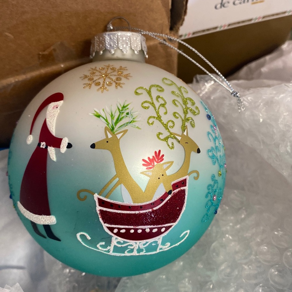 Assorted 9 Blown Glass Christmas ornament.